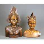 A pair of Indonesian carved hardwood busts, tallest 35cm.