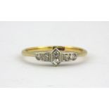 An Art Deco 18ct yellow gold and platinum diamond set ring, (M).