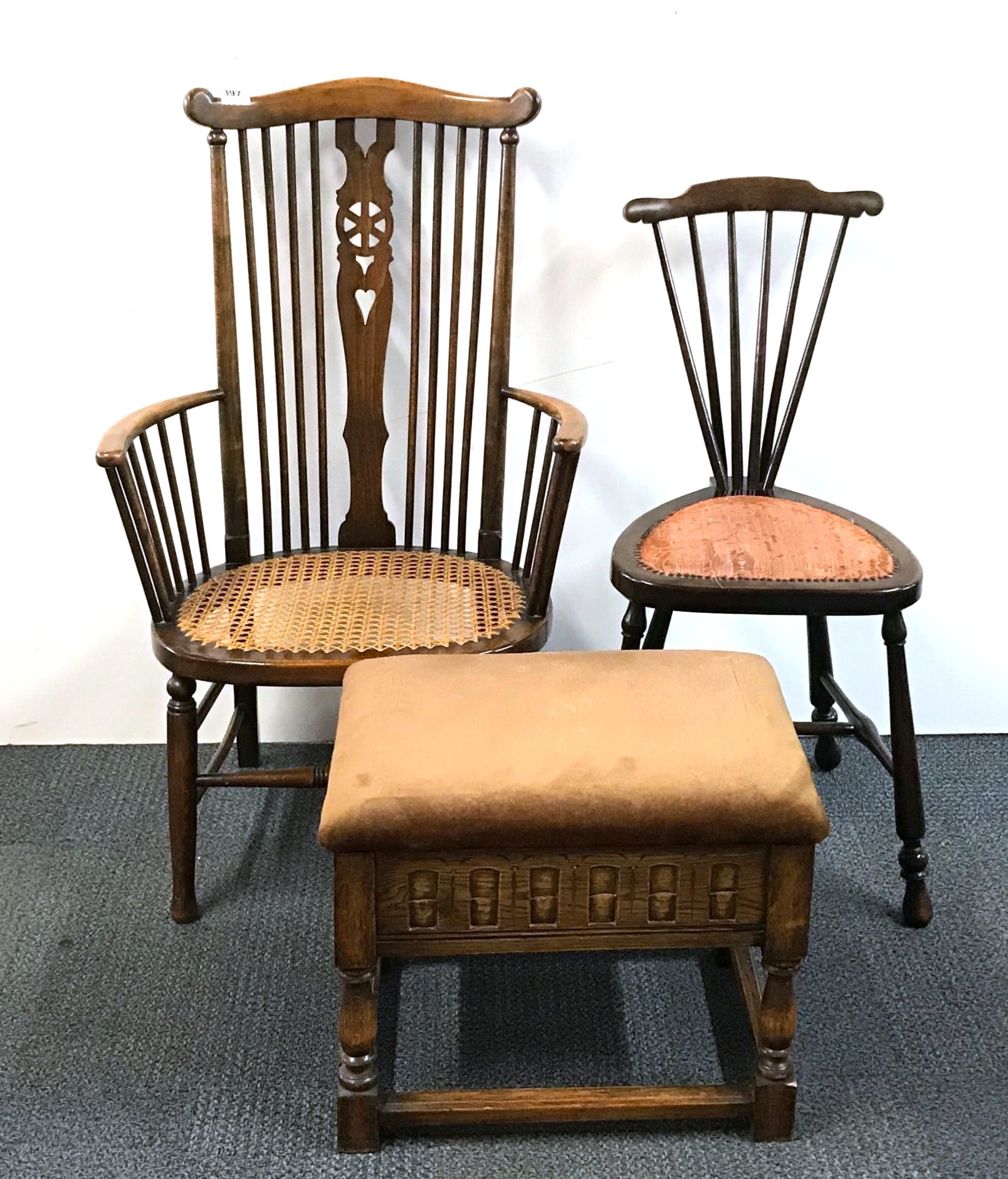 A lovely cane seated Arts and Crafts chair together with a further Arts and Crafts chair and an