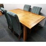 A contemporary solid oak extending dining table, 90 x 130cm, extending to 160cm.