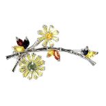 A 925 silver floral brooch with a revolving flower, set with marquise and round cut sapphires and