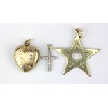 A 9ct yellow gold five pointed star, a yellow metal (tested 9ct gold) stone set cross pendant