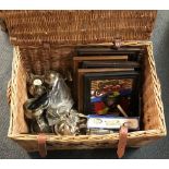 A wicker basket containing a quantity of mixed silver plate, five mirrors etc.