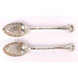 A pair of hallmarked silver shell bowl coffee spoons by Henry Atkins (Sheffield 1909).