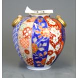 A fine Japanese hand painted and gilt Imari vase, H. 7.5cm.