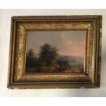 A 19th century gilt framed oil on board of a river scene, with a village in the background, 50 x