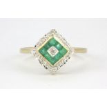 A 9ct yellow gold emerald and diamond set cluster ring, (M).