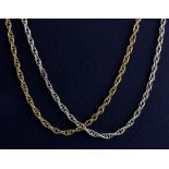 Two yellow metal (tested 9ct gold) chains, L. 60cm.