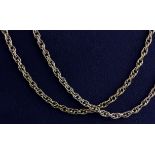 Two yellow metal (tested 9ct gold) chains, L. 60cm.