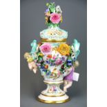 A fine 19th Century Meissen porcelain pot pourri jar and cover decorated with cherubs and flowers,