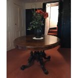 A superb mid 19th Century inlaid burr veneered tilt top pedestal tea table, raised on four columns