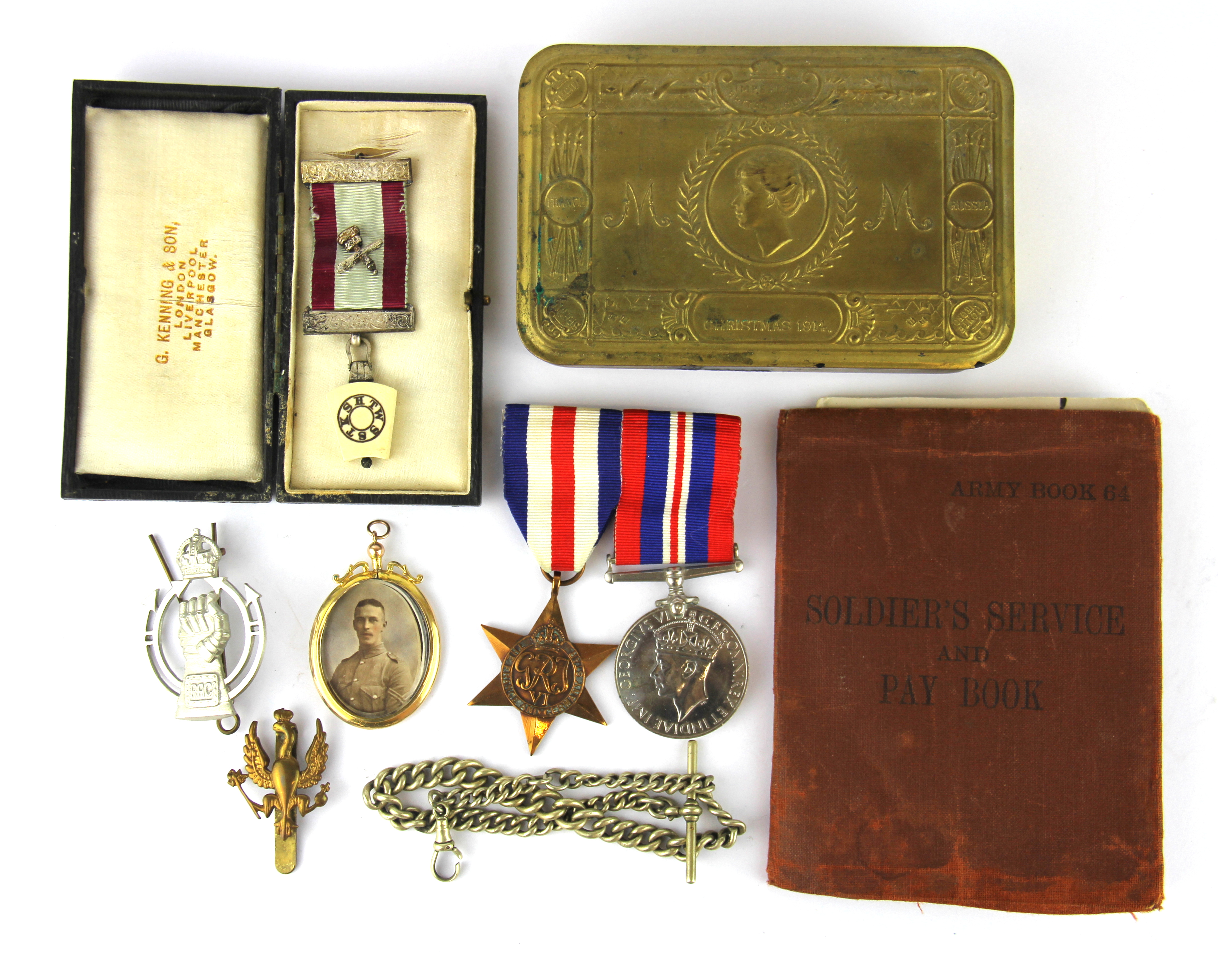 A 1914 Christmas tin with related First and Second World War contents.