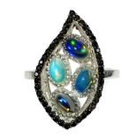 A 925 silver ring set with opals and black spinels, (Q).
