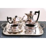 A large four piece silver plated tea set and tray, tray W. 62cm.
