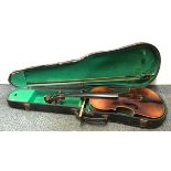 An old cased violin.