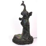 An unusual Tiffany style peacock table lamp, H. 49cm.