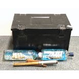 A Military ammunition case with a brass telescope and two ships in bottles.
