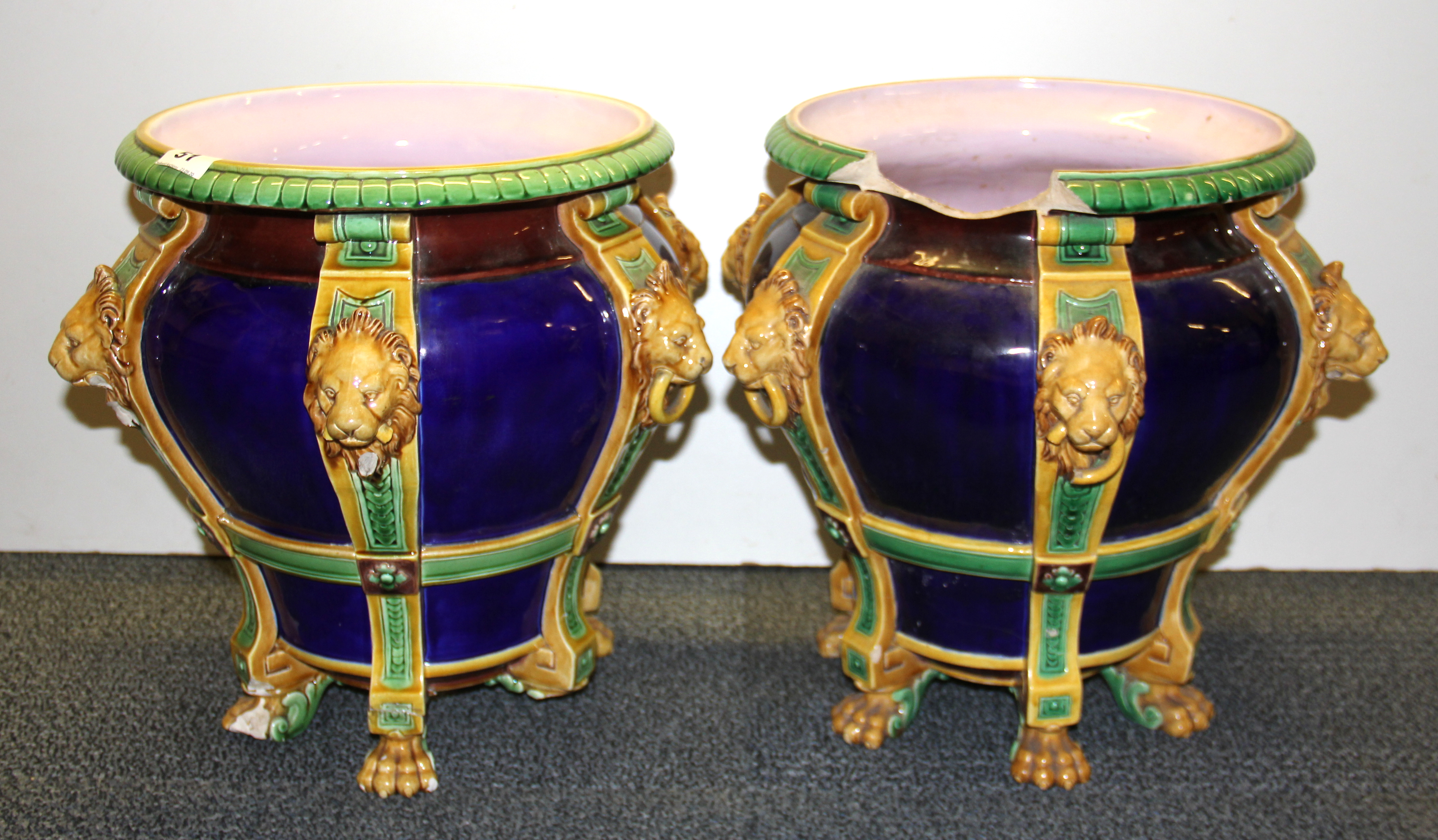 A pair of superb large 19th Century Minton Majolica planters, H. 36cm (both a/f).