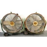 An interesting pair of large industrial Dry Super Tyres metal electric fans, W. 92cm, H. 97cm.