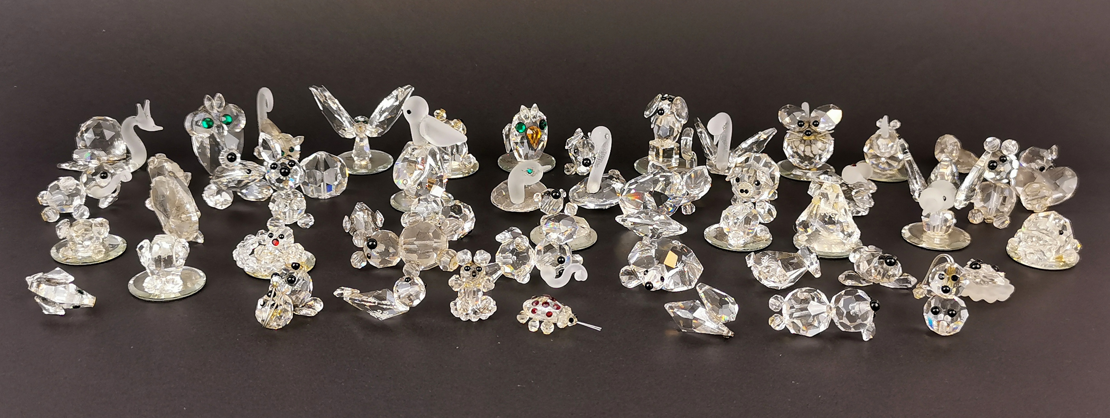 A collection of Mayfair crystal figurines.