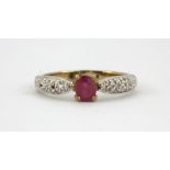 A 9ct yellow gold ring set with a ruby and diamond shoulders, (two small diamonds missing), (L).