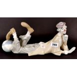 A large adult Lladro clown figure, L. 37cm. No visible damage or repair.