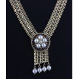 A heavy 14ct yellow gold (stamped 14k) necklace set with pearls and sapphires, L. 37cm.