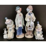A group of four Lladro junior clown figures, tallest 23cm. No visible damage or repair.