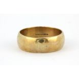 A 9ct yellow gold ring, (W).