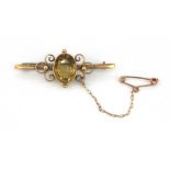 A 9ct yellow gold citrine set brooch, L. 4.5cm.