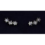 A pair of 9ct yellow gold stone set stud earrings.