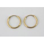 A pair of 9ct yellow gold hoop earrings, Dia. 1.4cm.