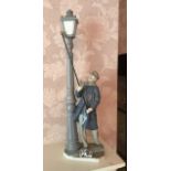 A large Lladro figure of the lamp lighter, H. 47cm.