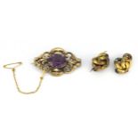 A Victorian yellow metal (tested 9ct gold) amethyst set brooch together with two further yellow