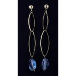 A pair of 18ct yellow gold (stamped 750) drop earrings set with blue topaz, with 9ct yellow gold