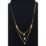 An 18ct yellow gold necklace, L. 38cm.