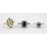 Three 925 silver stone set rings.