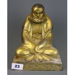 A Chinese gilt bronze figure of Da Mo, H. 22cm.