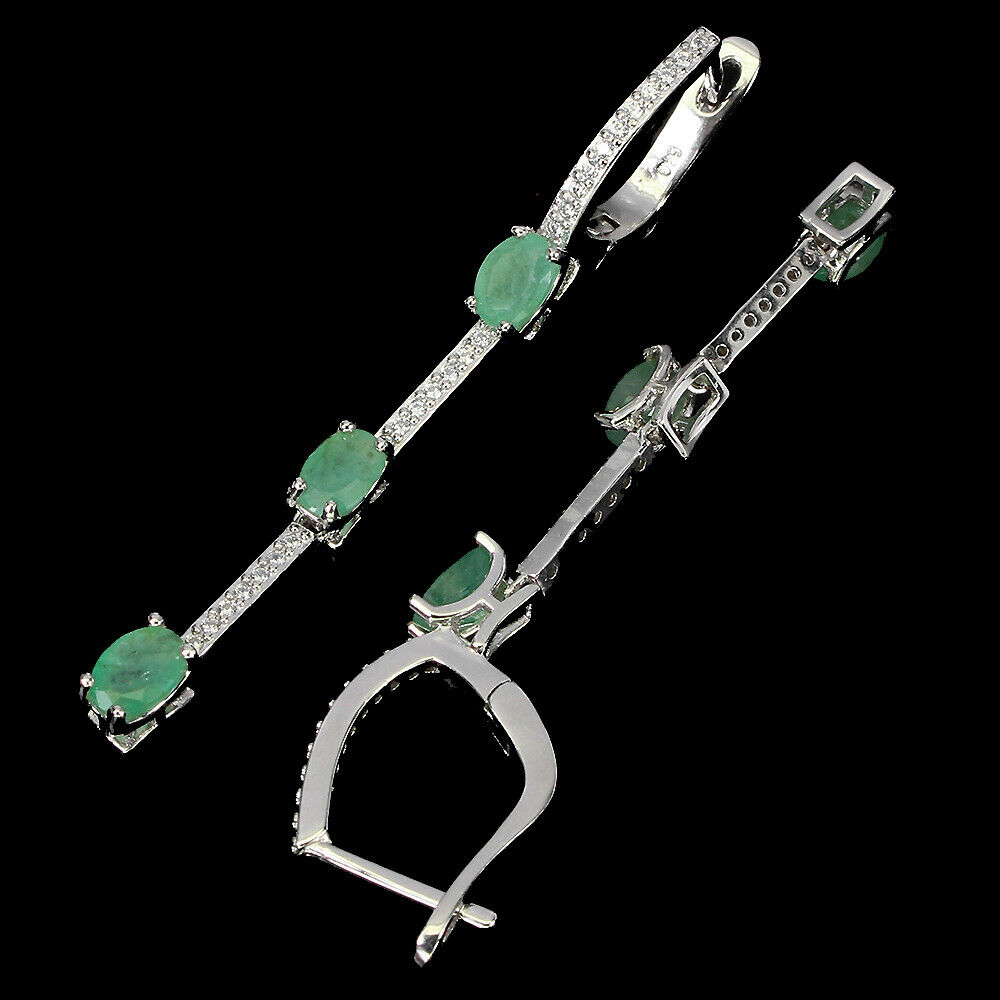 A pair of 925 silver drop earrings set with oval cut emeralds and white stones, L. 5.7cm. - Image 2 of 2