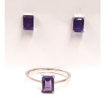 A marching pair of 925 silver stud earrings and ring set with emerald cut amethyst, (P).