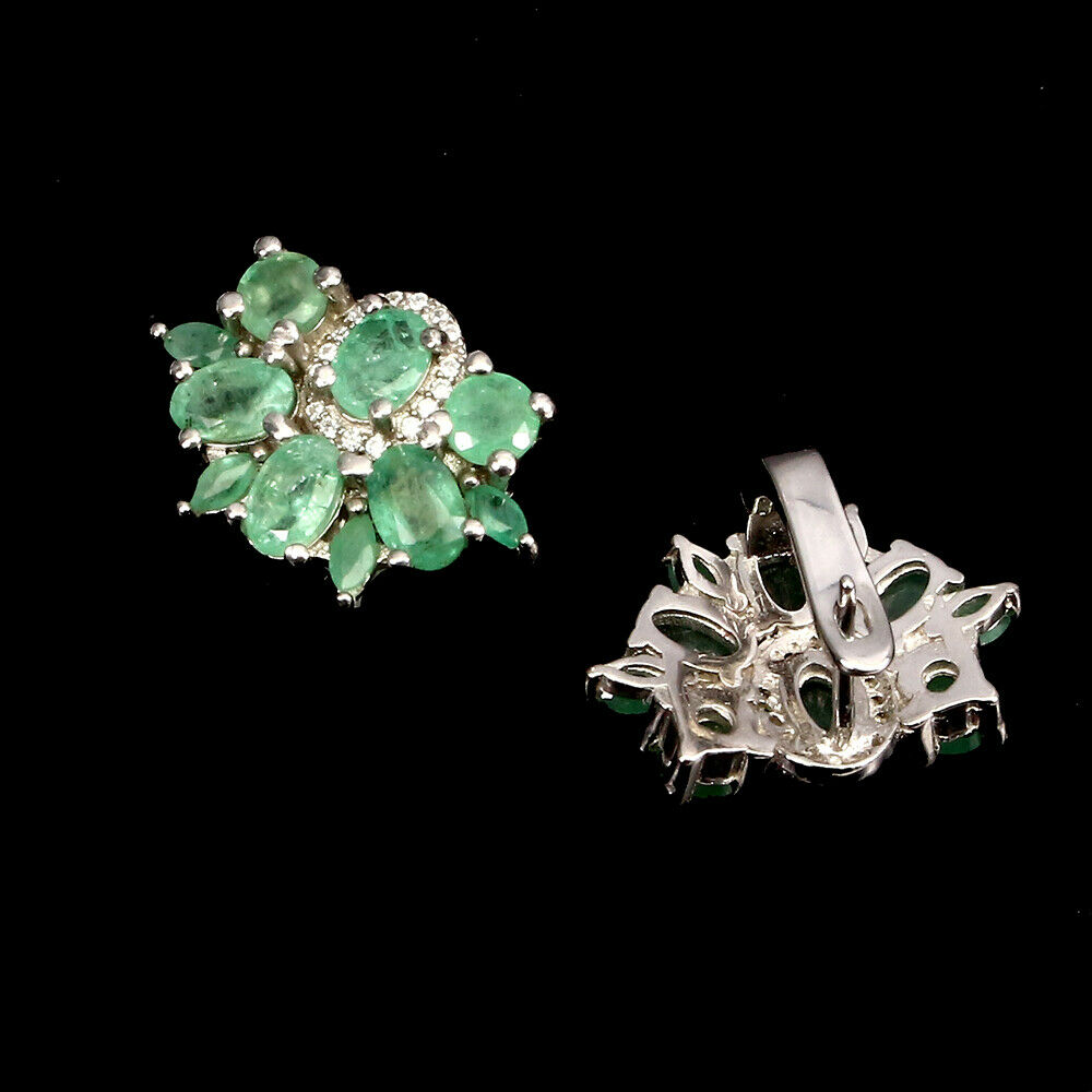 A pair of 925 silver earrings set with oval cut emeralds, L. 1.2cm. - Image 2 of 2