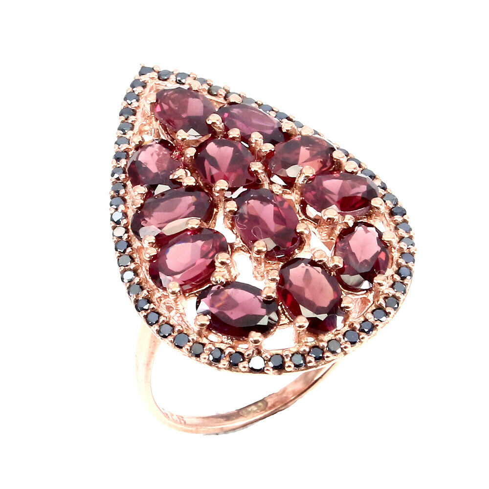 A 925 silver rose gold gilt ring set with oval cut garnets and black spinels, (O). - Image 2 of 2