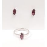 A marching pair of 925 silver stud earrings and ring set with marquise cut pink tourmaline, (O).