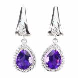 A pair of 925 silver drop earrings set with pear cut amethysts and white stones, L. 3cm.