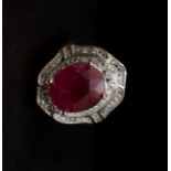 A 925 silver ring set with a large oval cut ruby surrounded by white stones, (N.5).