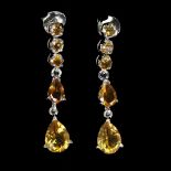 A pair of 925 silver drop earrings set with pear and round cut citrines, L. 5cm.
