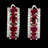 A pair of 925 silver ruby set earrings, L. 1.5cm.