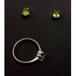 A pair of 925 silver stud earrings set with pear cut peridot and matching ring, (N.5).