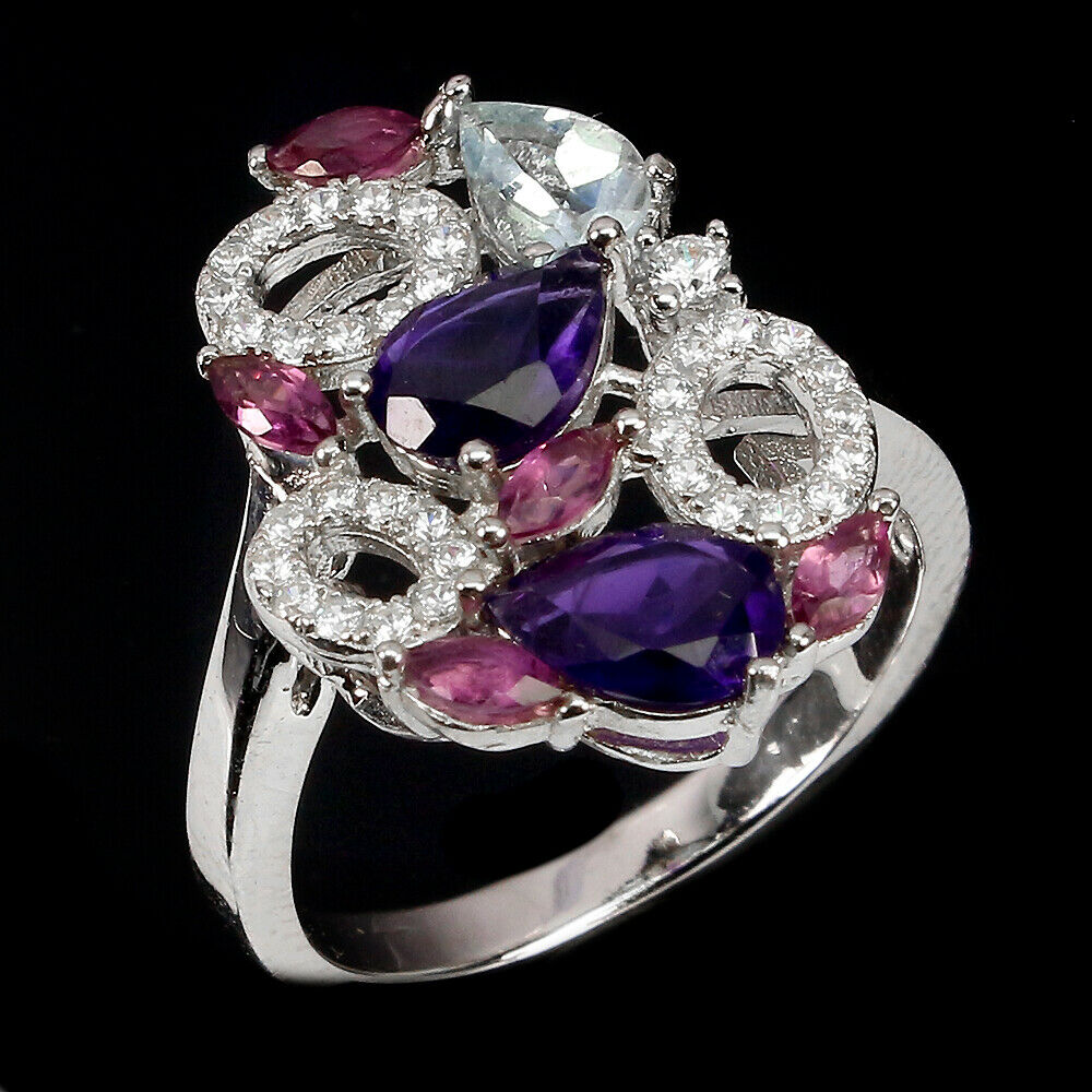 A 925 silver ring set with pear cut amethyst and pink tourmalines, (O.5). - Image 2 of 2