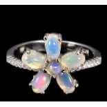 A 925 silver opal and white stone set ring, (O).